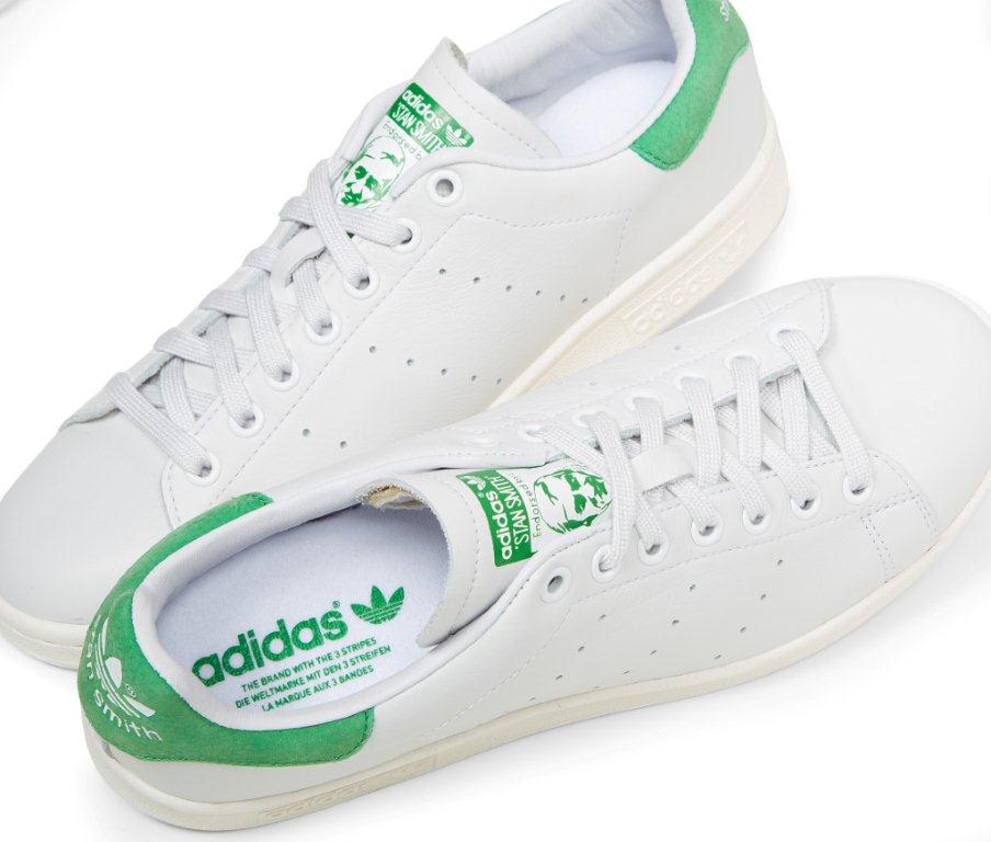 white adidas with green back