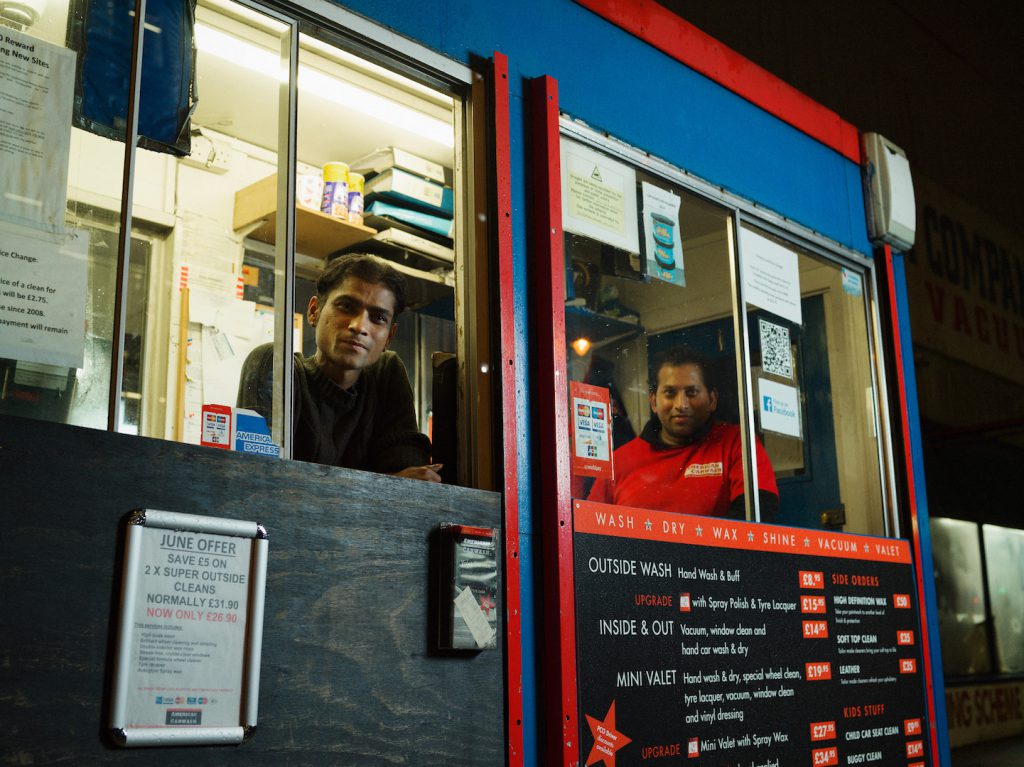 3am Mohammad Ali Chowdury and Rofiki at The American Car Wash Company, Shoreditch Photographed as part of the 24 hour photo story 'The Longest Day - A Portrait of East London' by Tom Oldham on 20th June 2016 Tom shot one portrait every hour from midnight to midnight on the longest day, shooting a huge cross section of the inhabitants of East London
