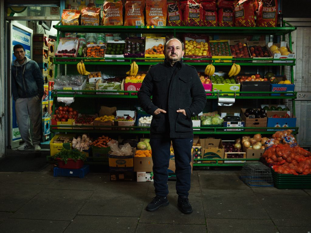 4am Aziz, Uludag Food and Wine, Kingsland Road Photographed as part of the 24 hour photo story 'The Longest Day - A Portrait of East London' by Tom Oldham on 20th June 2016 Tom shot one portrait every hour from midnight to midnight on the longest day, shooting a huge cross section of the inhabitants of East London